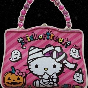 hello kitty trick or treat halloween purse tin